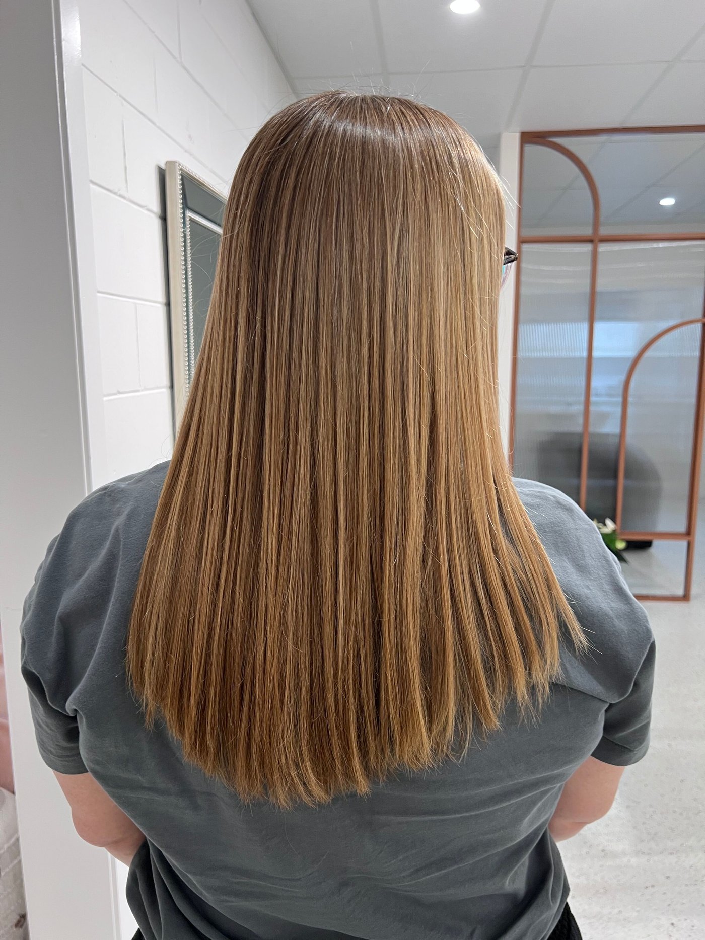 Smoothed, frizz-free hair after BR Soul Botox smoothing treatment