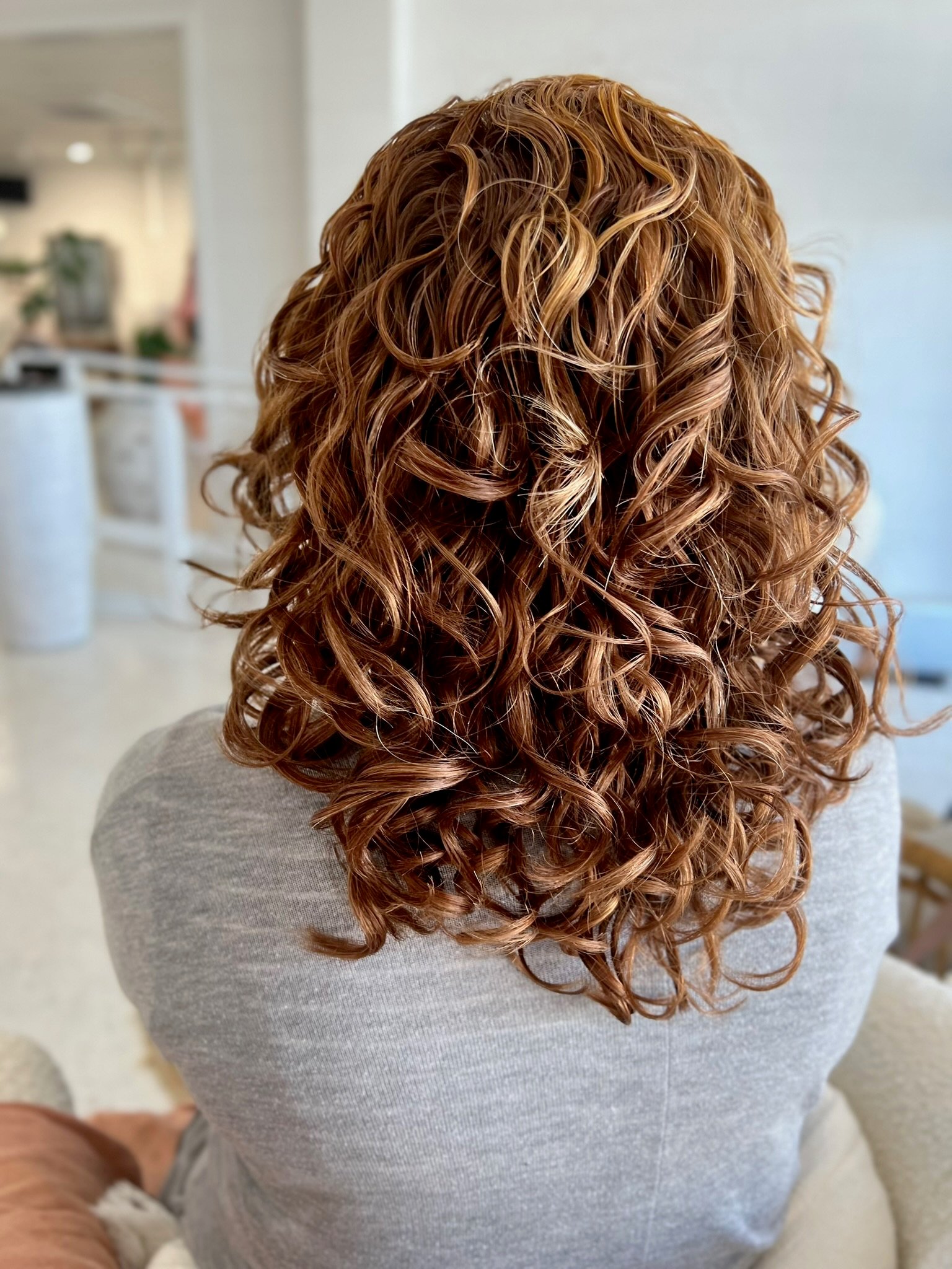 Curly hair cut and styling work at About Hair Mackay, example 4