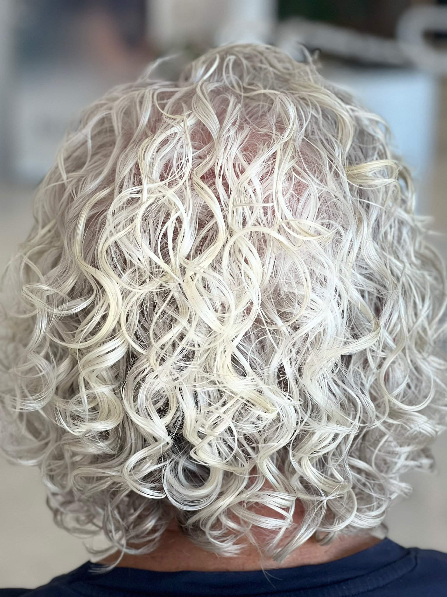 Curly hair cut and styling work at About Hair Mackay, example 5