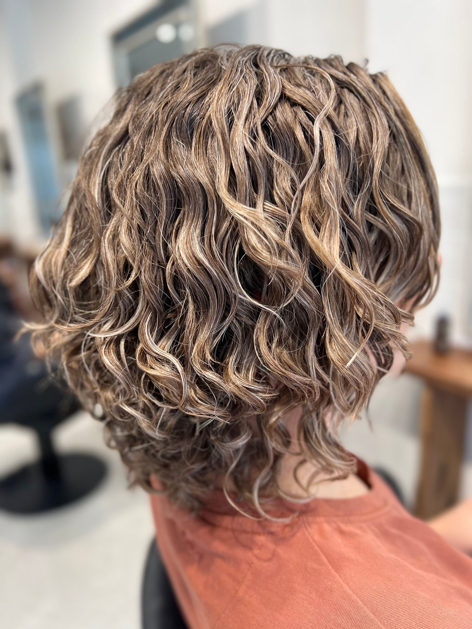 Curly hair cut and styling work at About Hair Mackay, example 7
