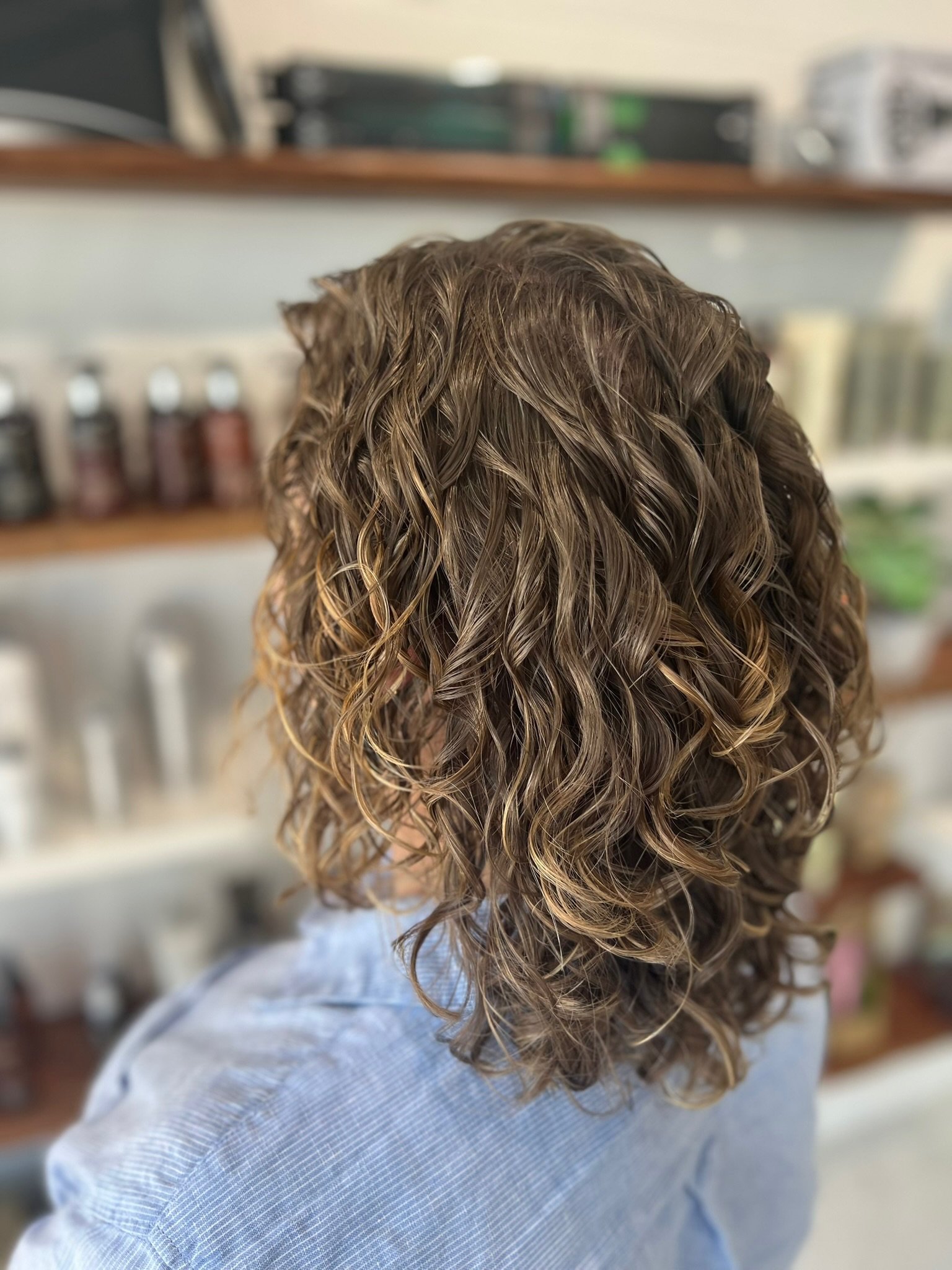 Curly hair cut and styling work at About Hair Mackay, example 8
